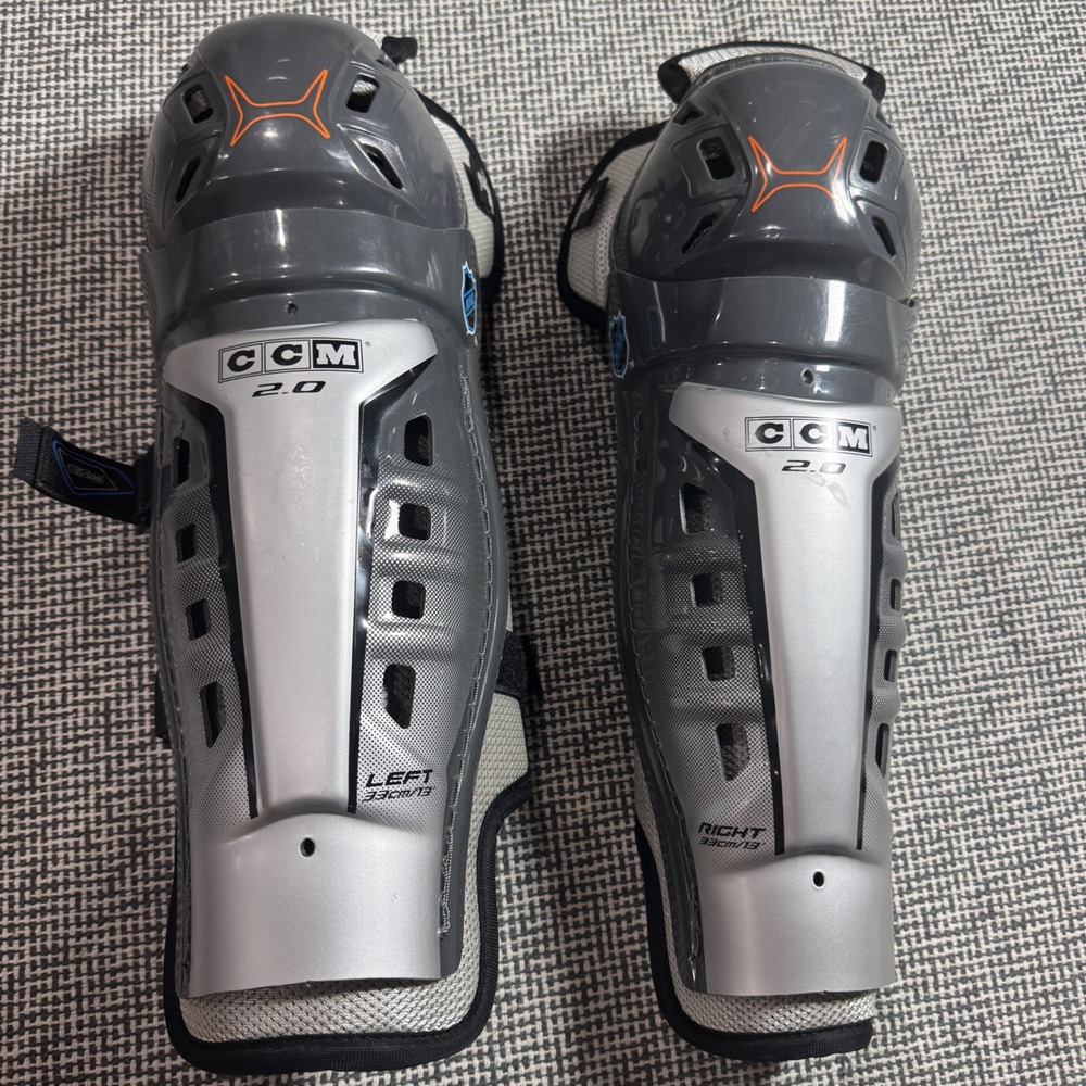 CCM 2.0 Junior Hockey Shin Guards 13 Inch 33cm Silver Grey NHL Pair SG2.0-13